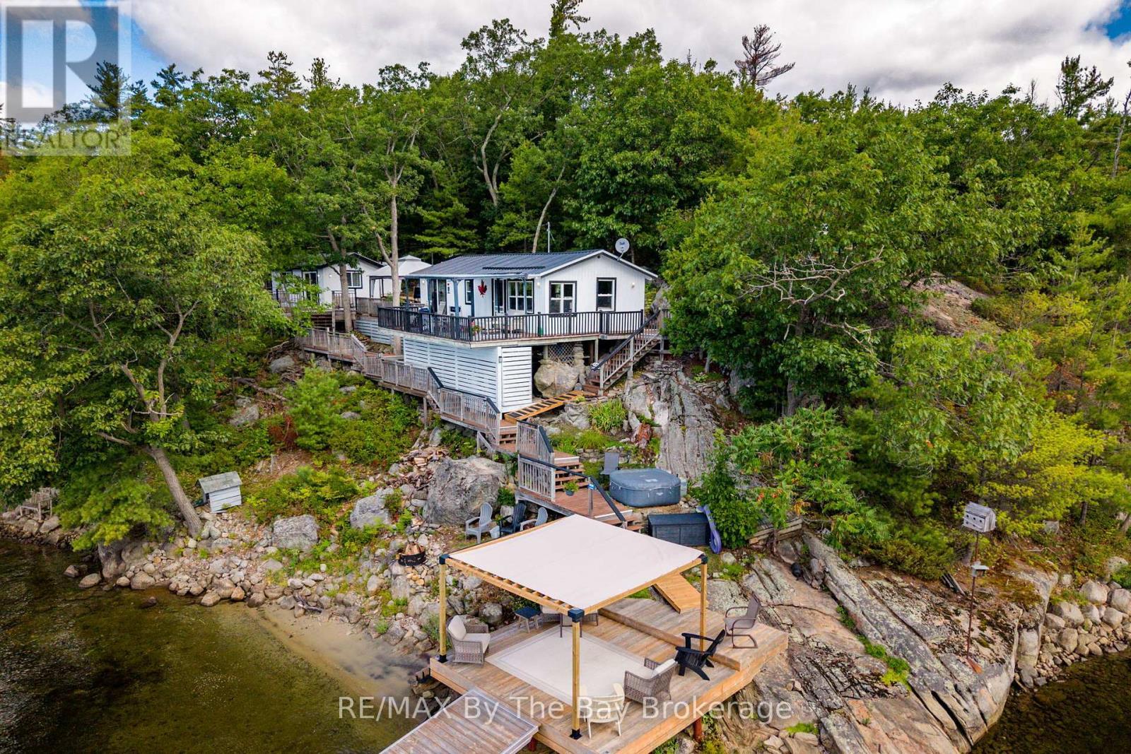 18588 Georgian Bay Shore, Georgian Bay (Gibson), ON - Outdoor With Body Of Water With Deck Patio Veranda