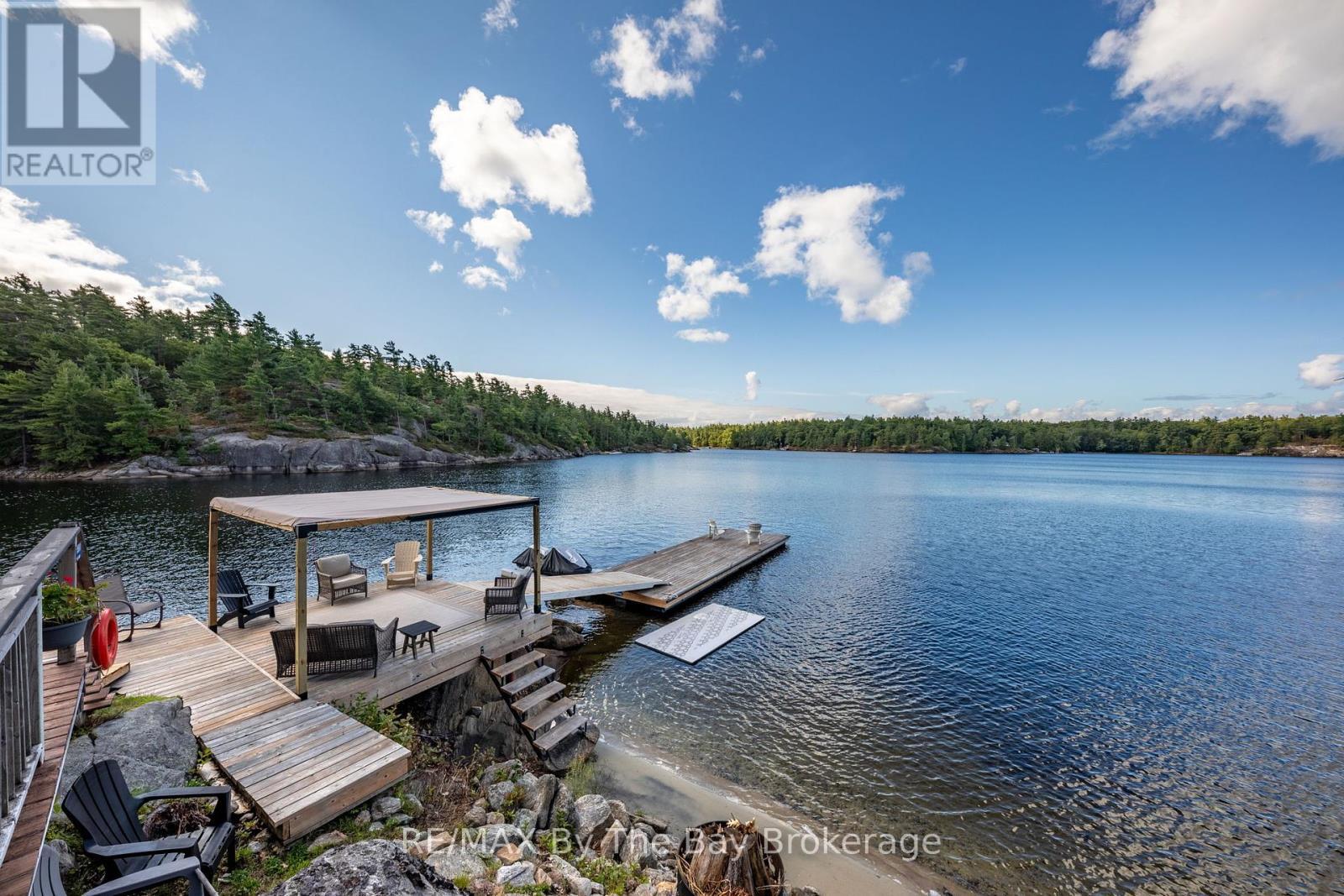 18588 Georgian Bay Shore, Georgian Bay (Gibson), ON - Outdoor With Body Of Water With Deck Patio Veranda With View