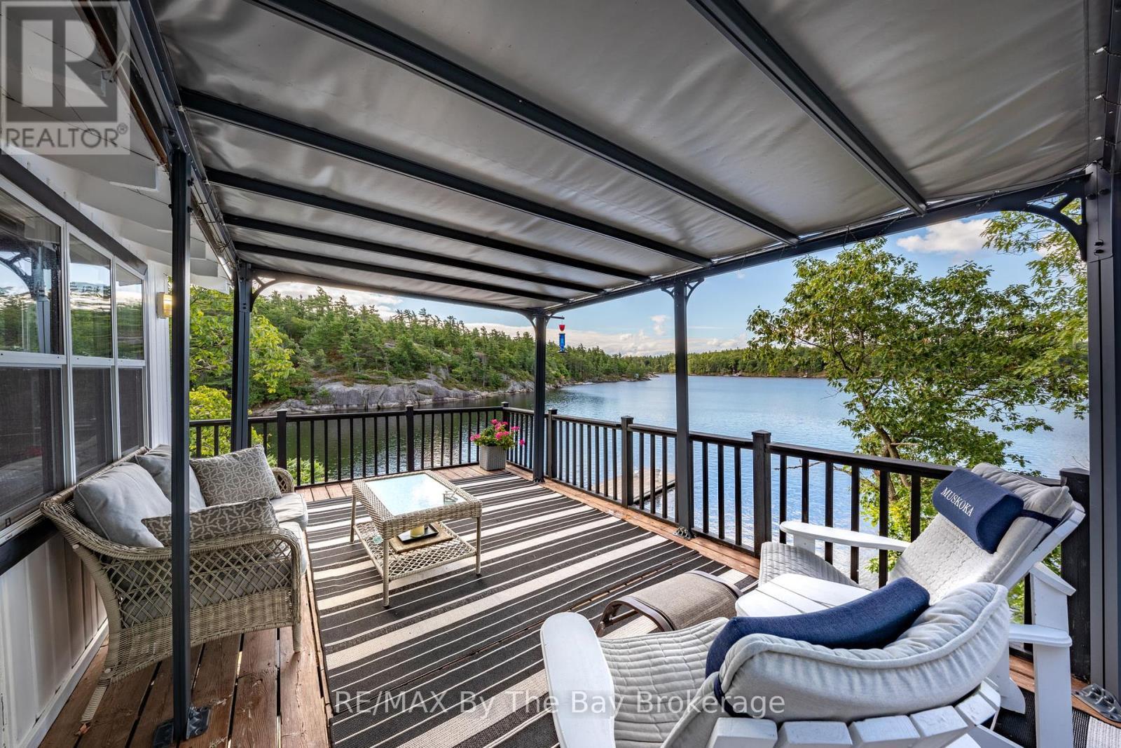 18588 Georgian Bay Shore, Georgian Bay (Gibson), ON - Outdoor With Body Of Water With Deck Patio Veranda With Exterior