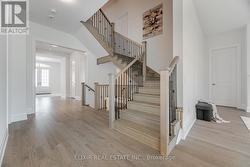 Elegant Oak Staircase w/ Iron Pickets -