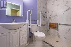 Updated bathroom with roll in shower -