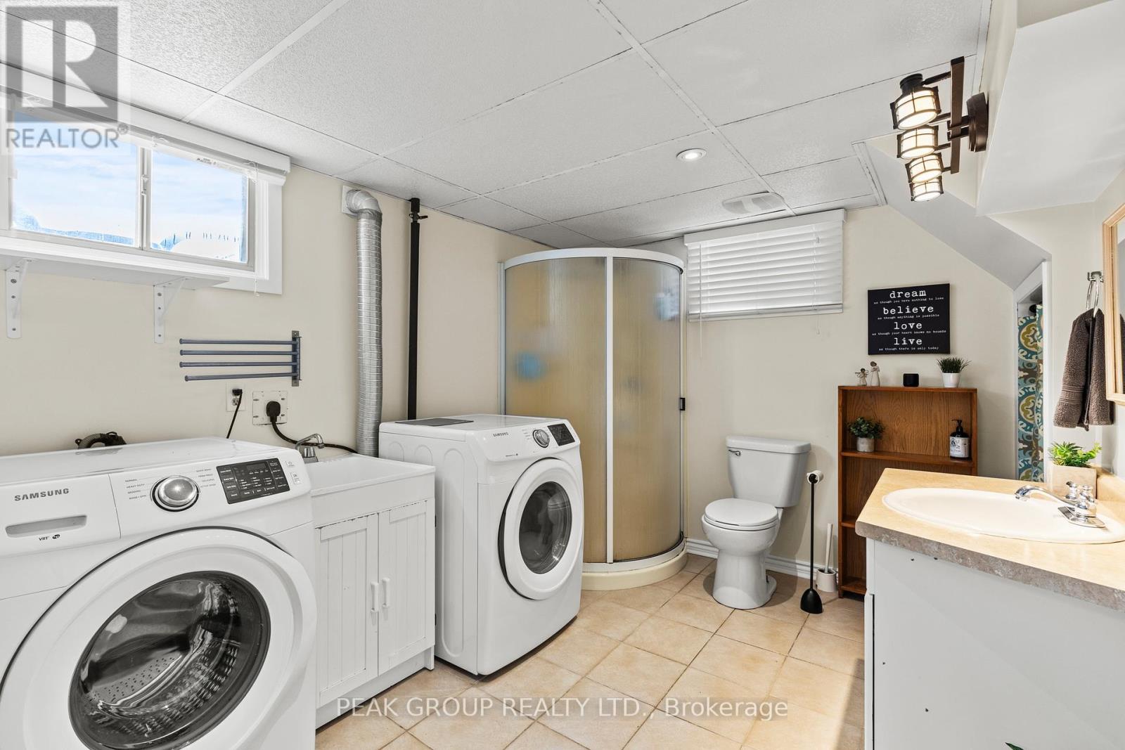 Lower level 3 pc bathroom with laundry - 47 David Street, Welland (Lincoln/Crowland), ON - Indoor Photo Showing Laundry Room