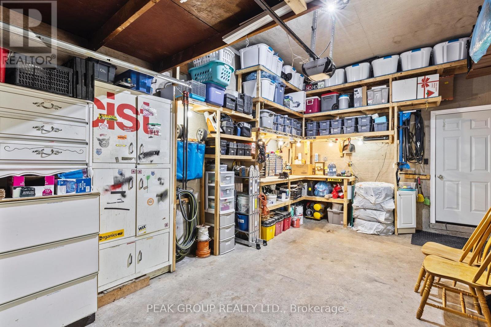 Attached garage with lots of storage and entrance - 47 David Street, Welland (Lincoln/Crowland), ON - Indoor Photo Showing Other Room