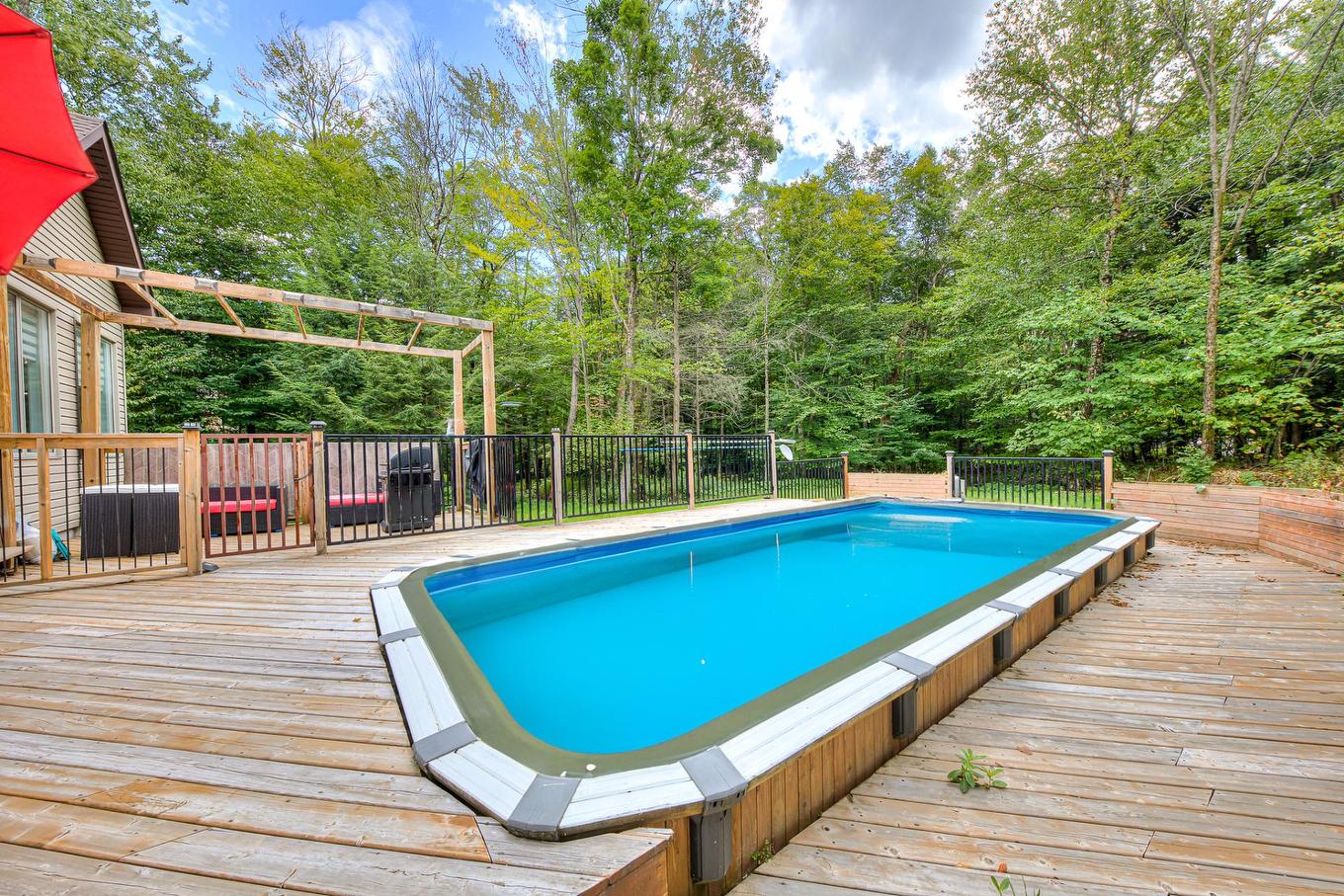 Pool - 162 Rue Du Sanctuaire, Saint-Colomban, QC - Outdoor With Above Ground Pool With Exterior