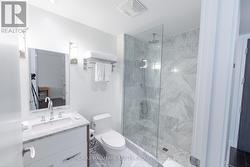 Bathroom with Glass Shower and Granite -