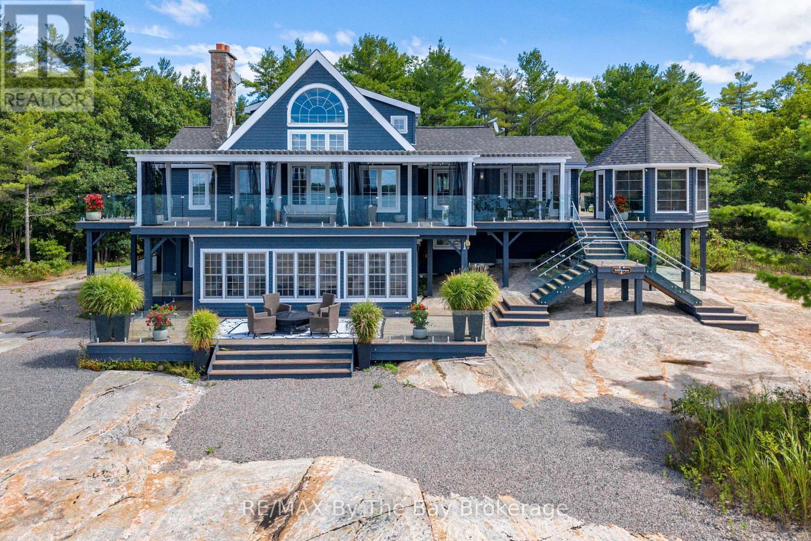 19980 Georgian Bay Shore, Georgian Bay (Gibson), ON - Outdoor With Deck Patio Veranda With Facade