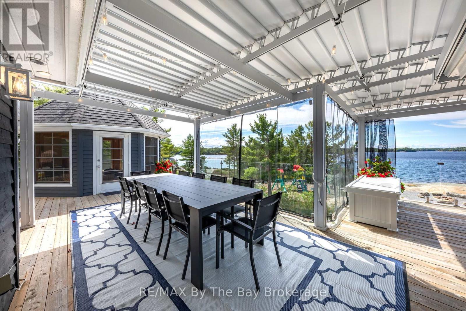 19980 Georgian Bay Shore, Georgian Bay (Gibson), ON - With Body Of Water With Deck Patio Veranda With Exterior