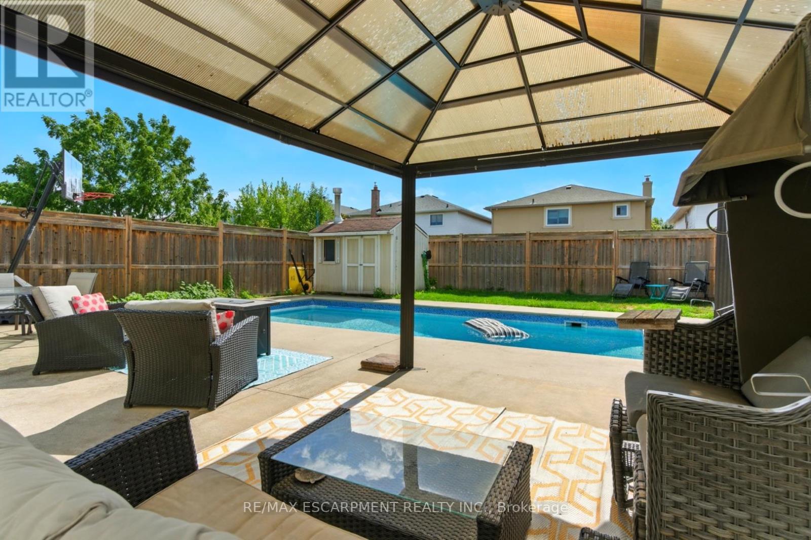 580 Deerhurst Drive, Burlington, ON - Outdoor With In Ground Pool With Deck Patio Veranda