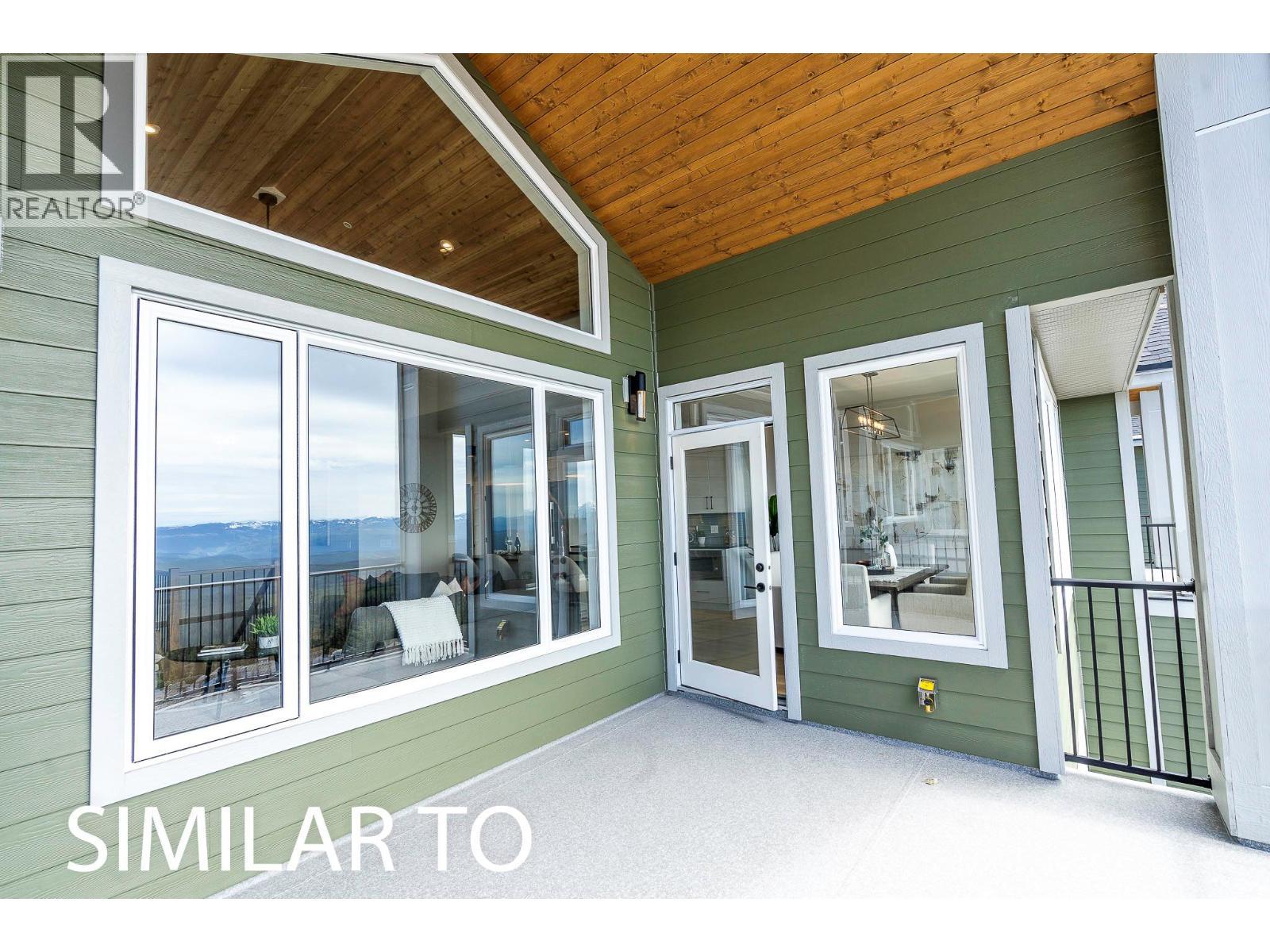 225A Grizzly Ridge Trail, Big White, BC - Outdoor With Deck Patio Veranda With Exterior