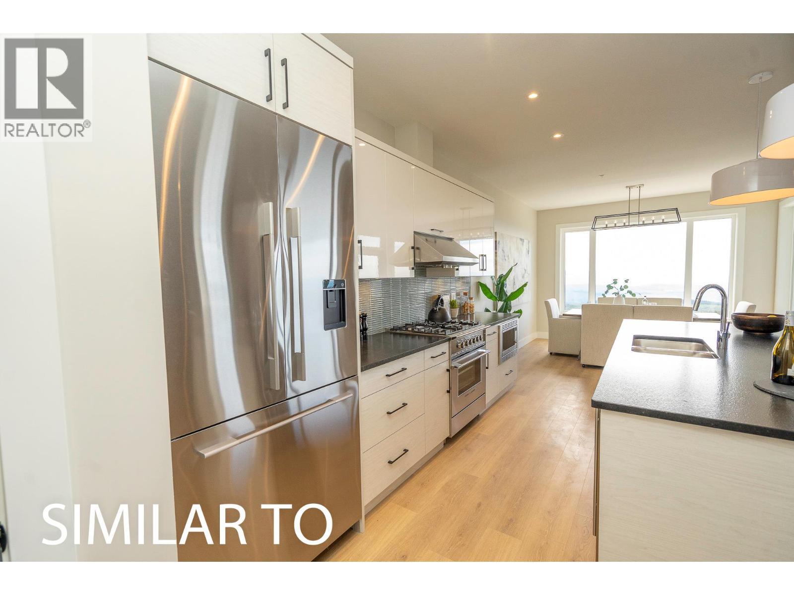 225A Grizzly Ridge Trail, Big White, BC - Indoor Photo Showing Kitchen With Double Sink With Upgraded Kitchen