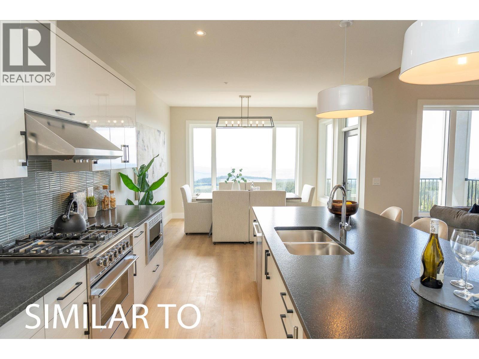 225A Grizzly Ridge Trail, Big White, BC - Indoor Photo Showing Kitchen With Double Sink With Upgraded Kitchen