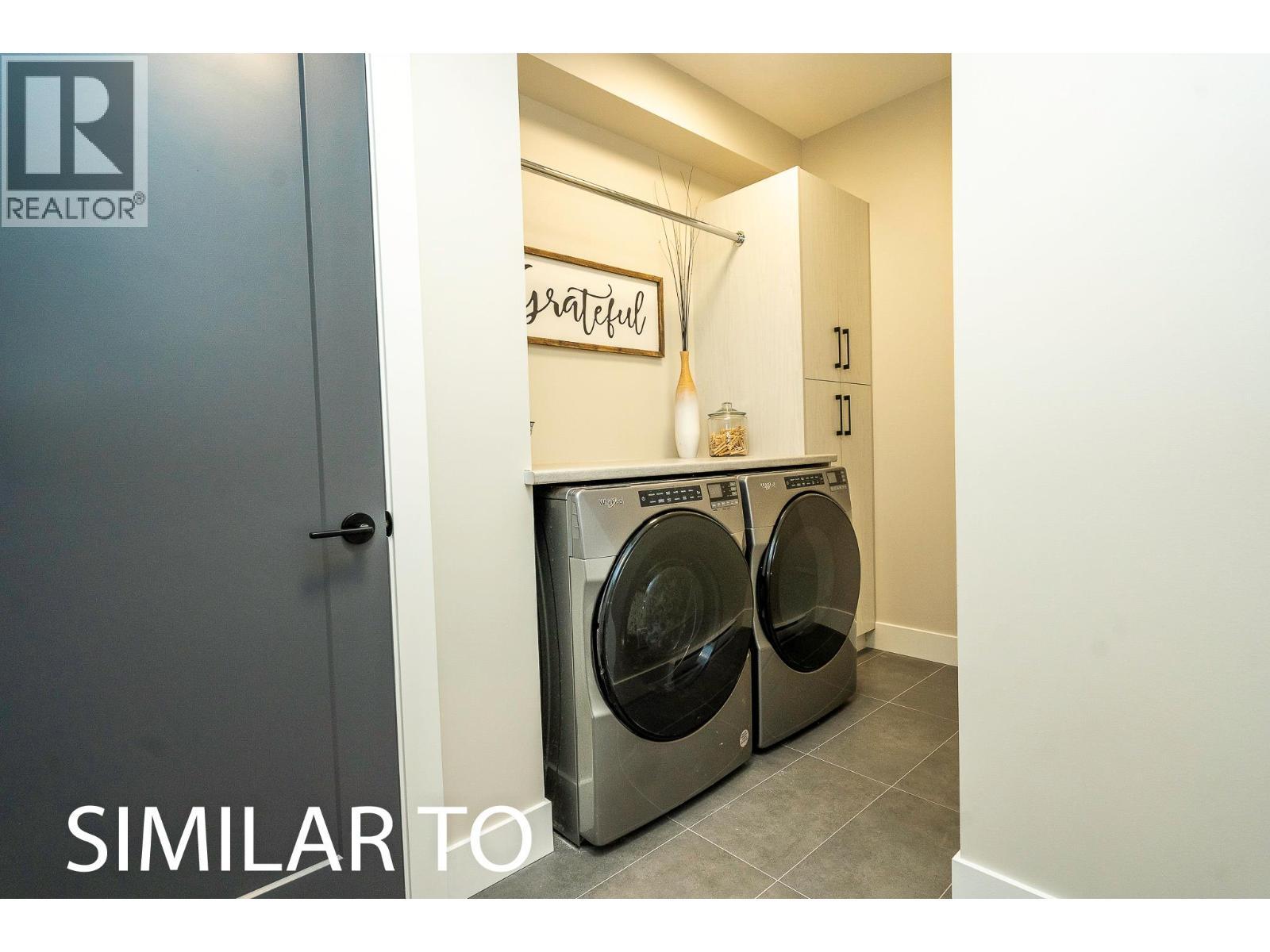 225A Grizzly Ridge Trail, Big White, BC - Indoor Photo Showing Laundry Room