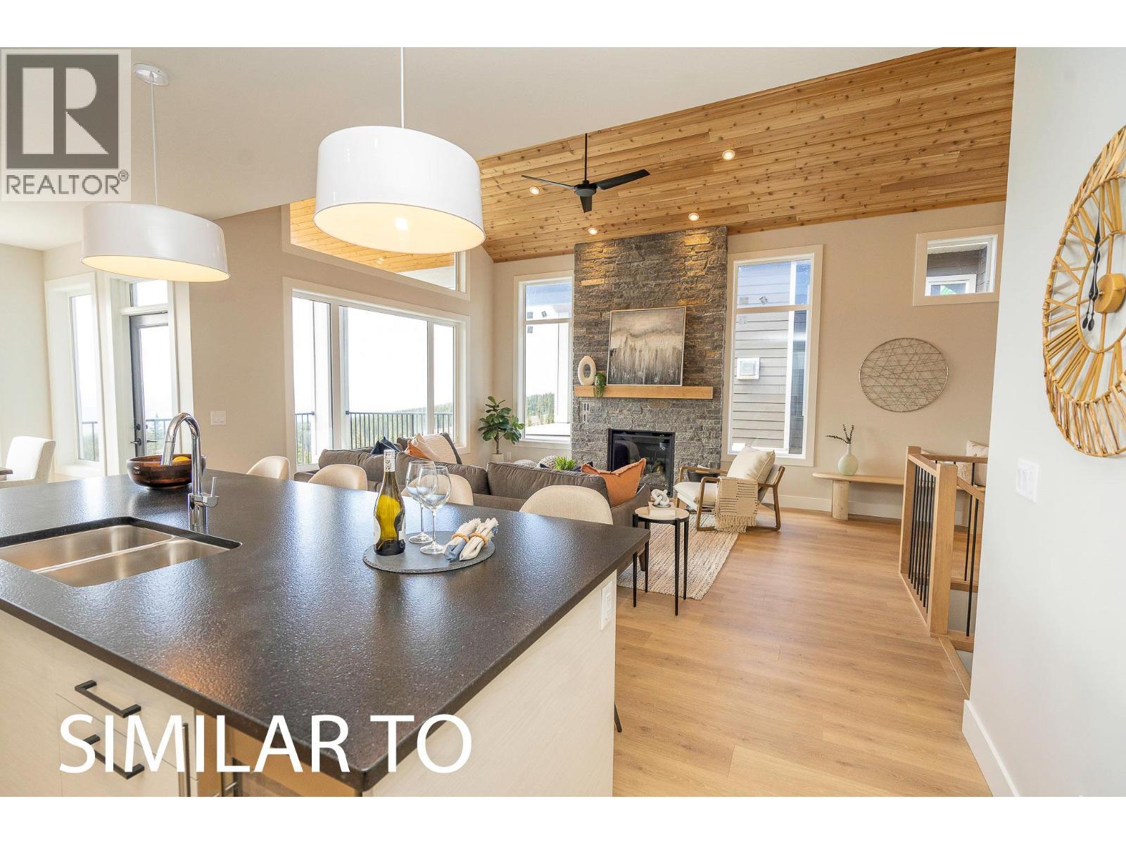 225A Grizzly Ridge Trail, Big White, BC - Indoor With Fireplace