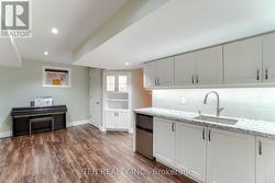 Finished Basement w/ Kitchenette & 3-pc Bathroom -