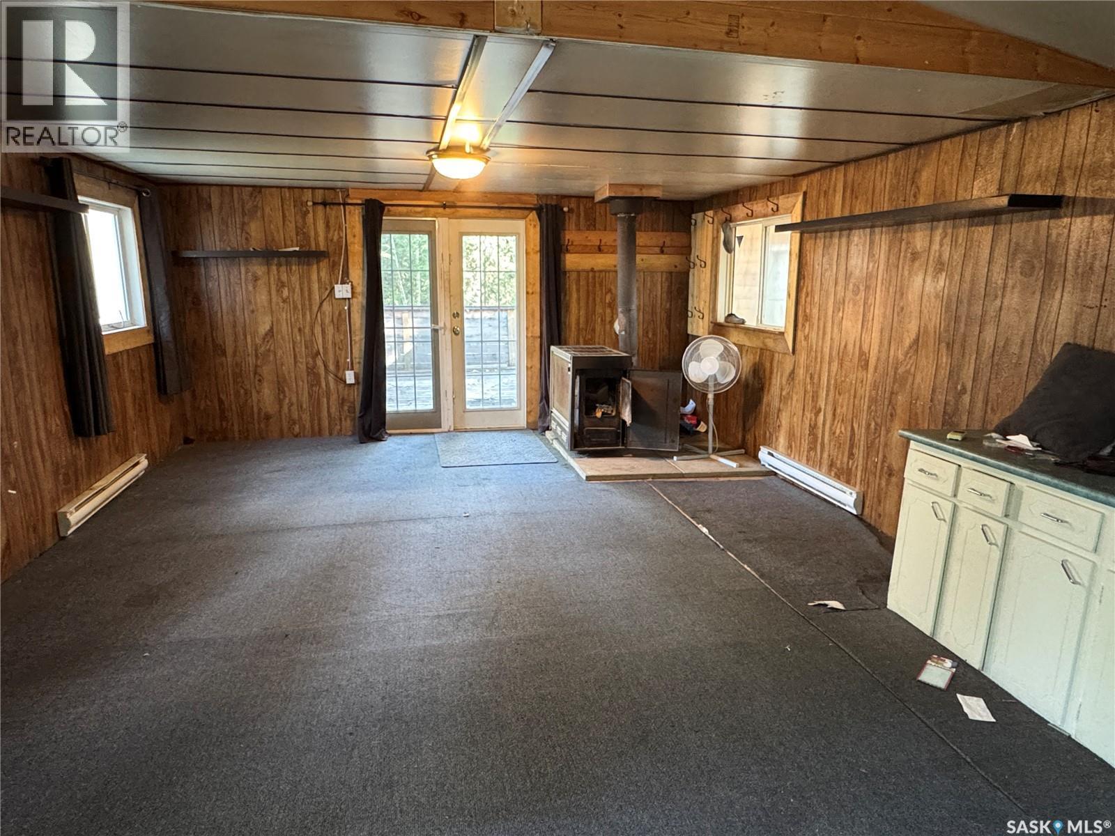 87 Wadin Drive, Northern Admin District, SK - Indoor With Fireplace