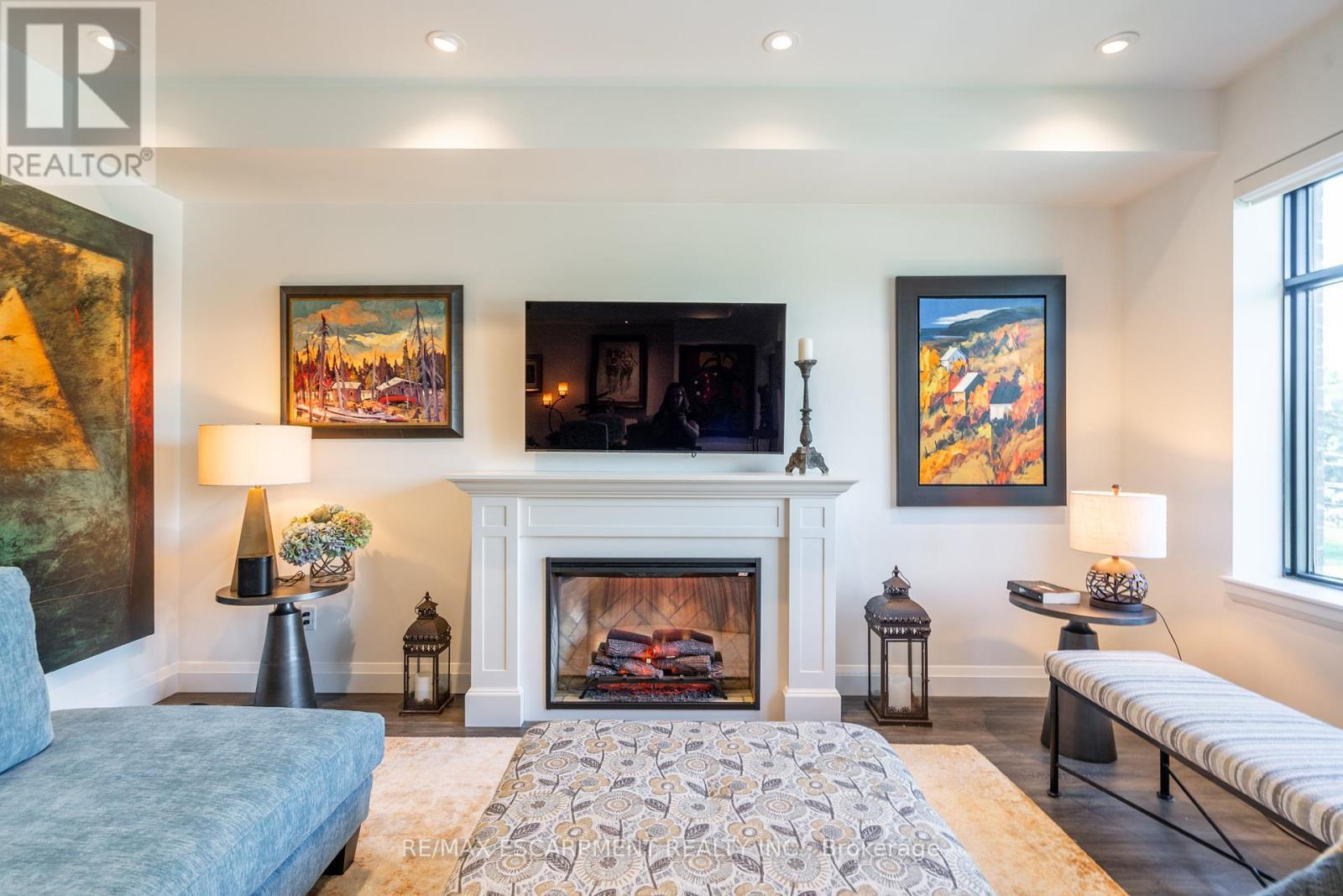 213 - 30 Hamilton Street S, Hamilton, ON - Indoor Photo Showing Living Room With Fireplace