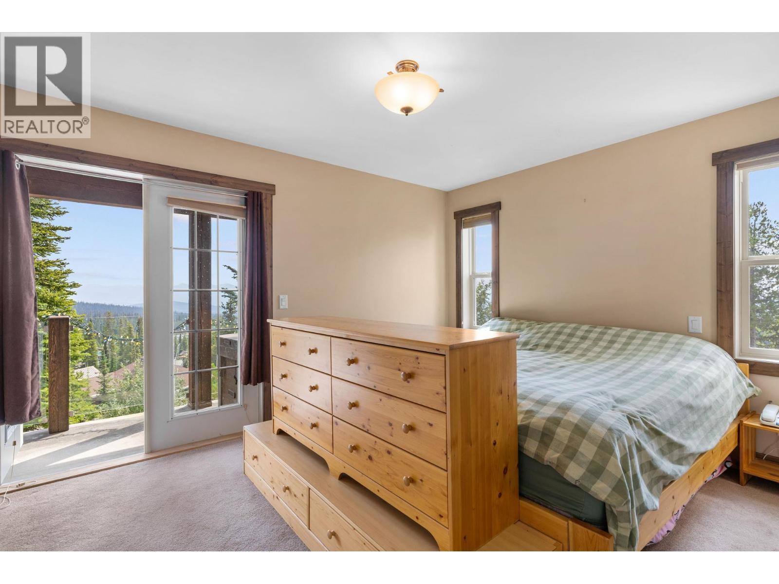 master - 5890 Snow Pines Crescent, Big White, BC - Indoor Photo Showing Bedroom