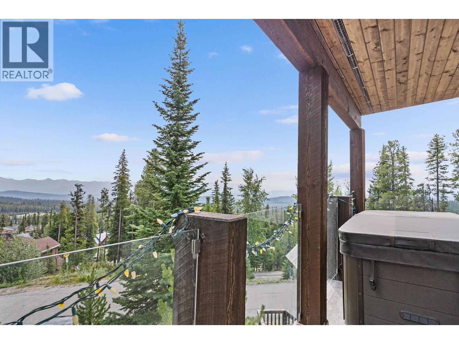 master bedroom deck - 5890 Snow Pines Crescent, Big White, BC - Outdoor With View With Exterior