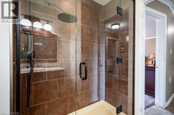 Full bath with a shower stall -
