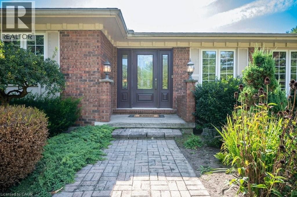 Property entrance featuring brick siding - 3 Meadowbrook Court, St. George, ON - Outdoor