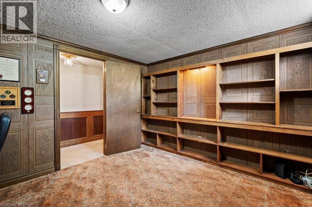 Unfurnished office with light colored carpet and a textured ceiling - 3 Meadowbrook Court, St. George, ON - Indoor Photo Showing Other Room