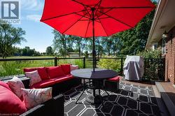 View of patio / terrace featuring outdoor lounge area, grilling area, and outdoor dining space -