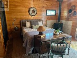 Main Floor Primary Bedroom Suite -