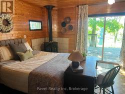 Main Floor Primary Bedroom walkout to deck -