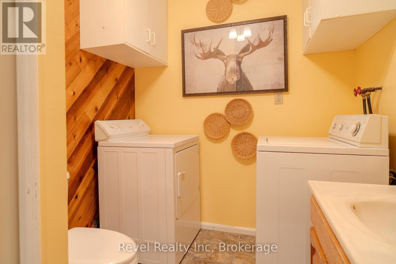Lower level bathoom and laundry - 14 Swallow Road, Mcdougall, ON - Indoor Photo Showing Laundry Room
