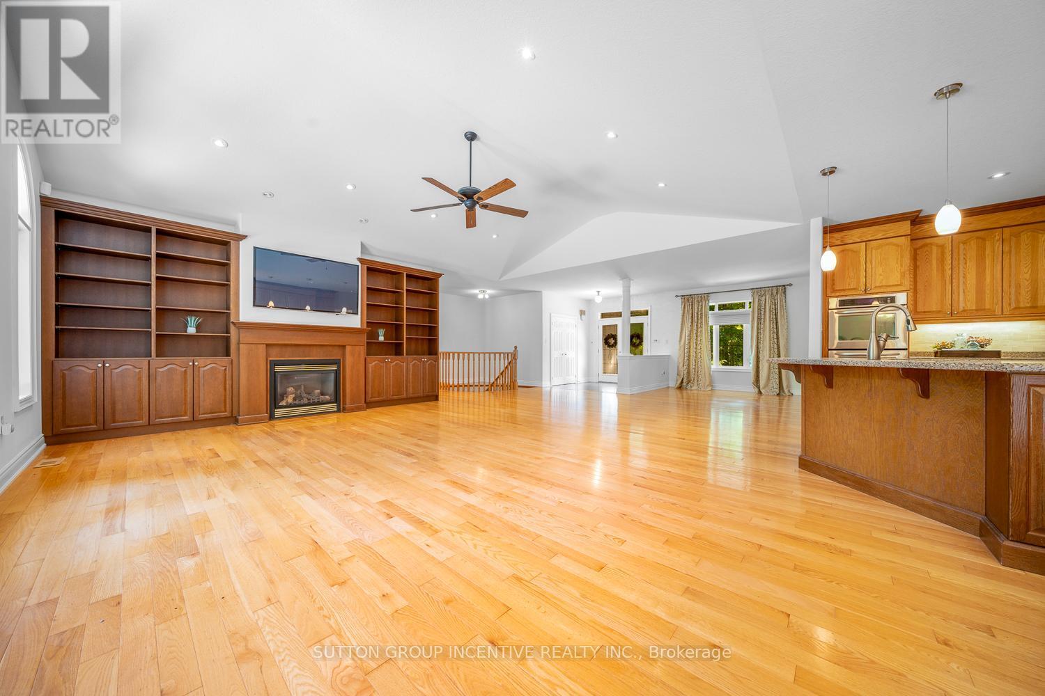 1882 Providence Lane, Severn, ON - Indoor Photo Showing Kitchen With Fireplace