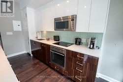 Kitchen with Quartz Counters & European Appliances -