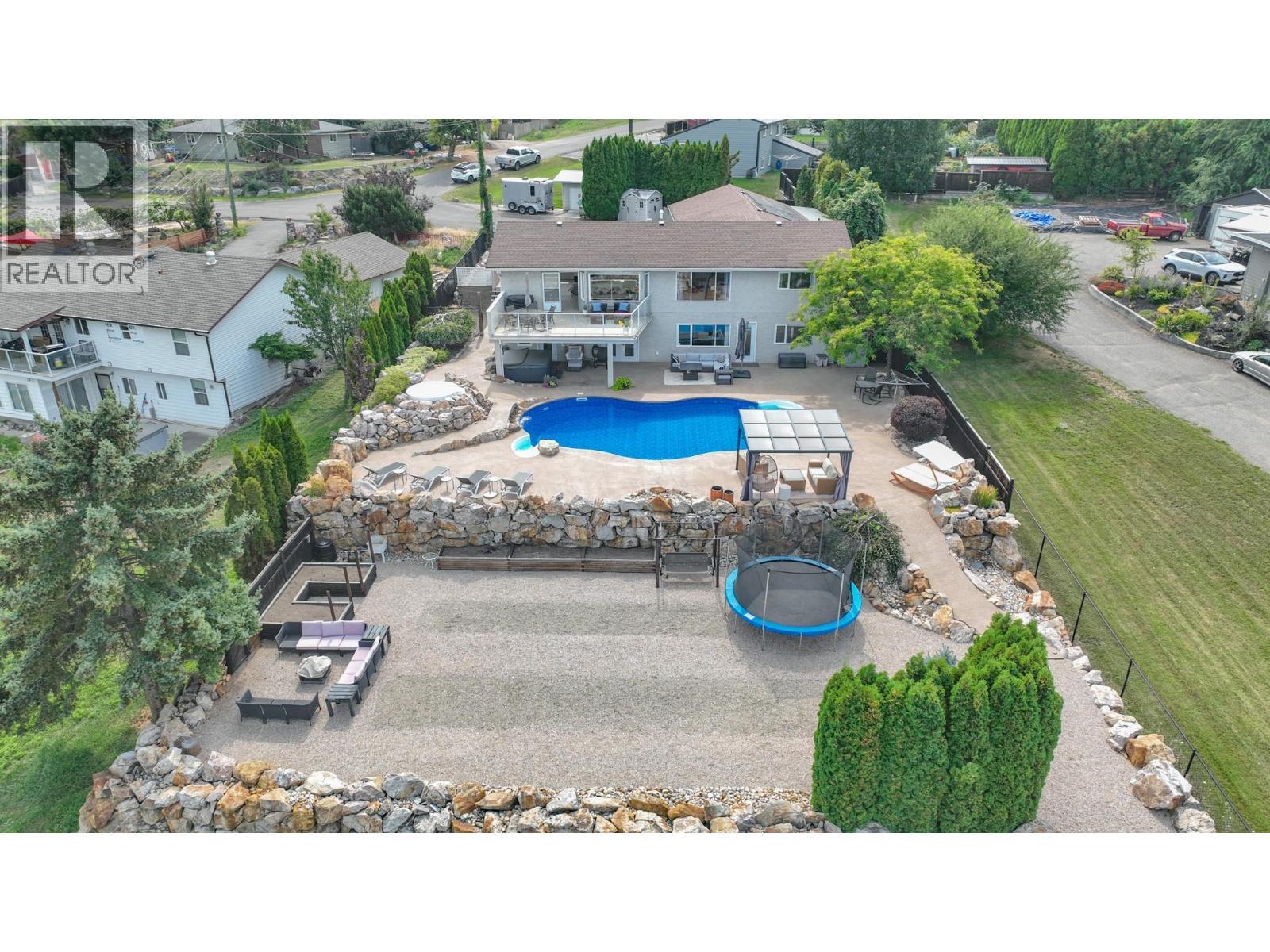 Stunning views and sunsets - 161 Cranberry Lane, Vernon, BC - Outdoor With In Ground Pool With View