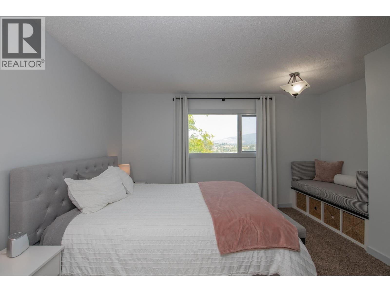 Upstairs bedroom with Ensuite (2pc) - 161 Cranberry Lane, Vernon, BC - Indoor Photo Showing Bedroom
