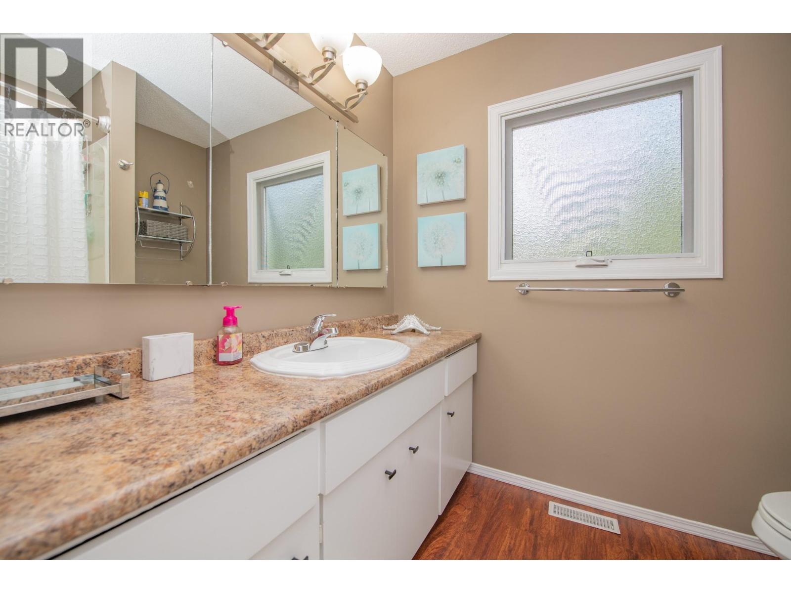 2nd upstairs bedroom - 161 Cranberry Lane, Vernon, BC - Indoor Photo Showing Bedroom