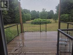 Lovely private deck overlooking the back yard -