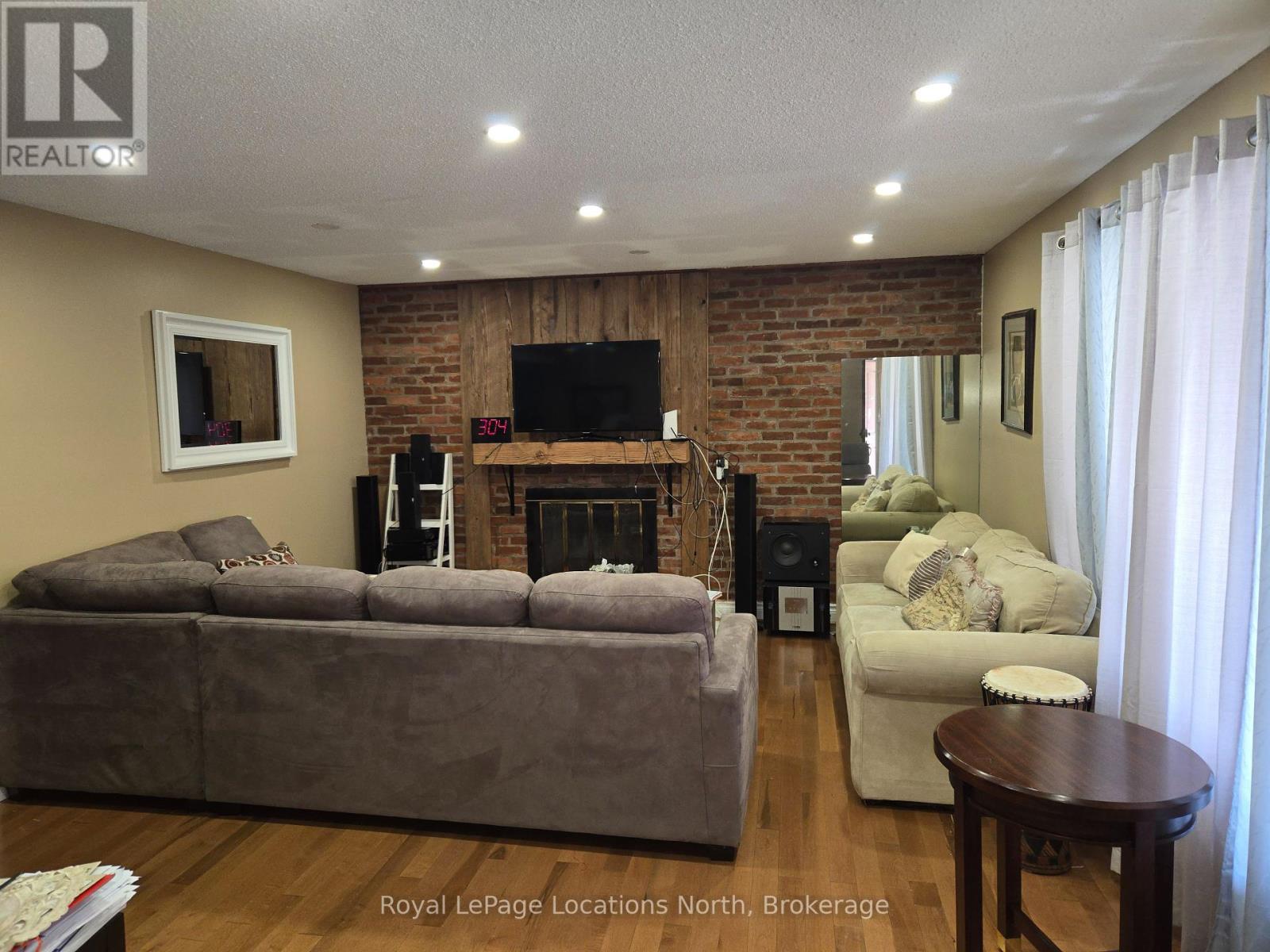 Large bright Living room - 6042 Highway 9 Highway, Caledon (Mono Mills), ON - Indoor With Fireplace