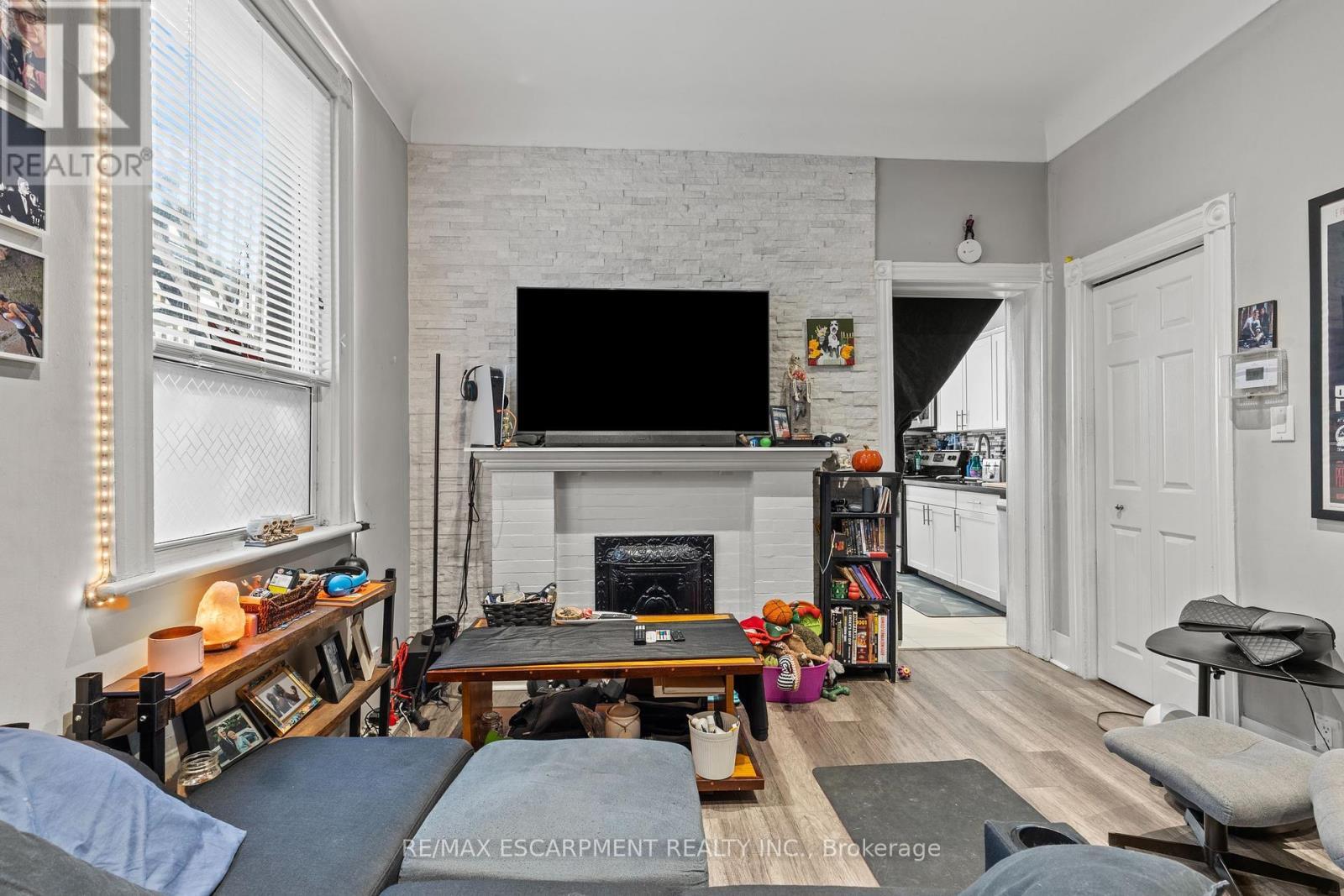 181 West Avenue, Hamilton, ON - Indoor With Fireplace