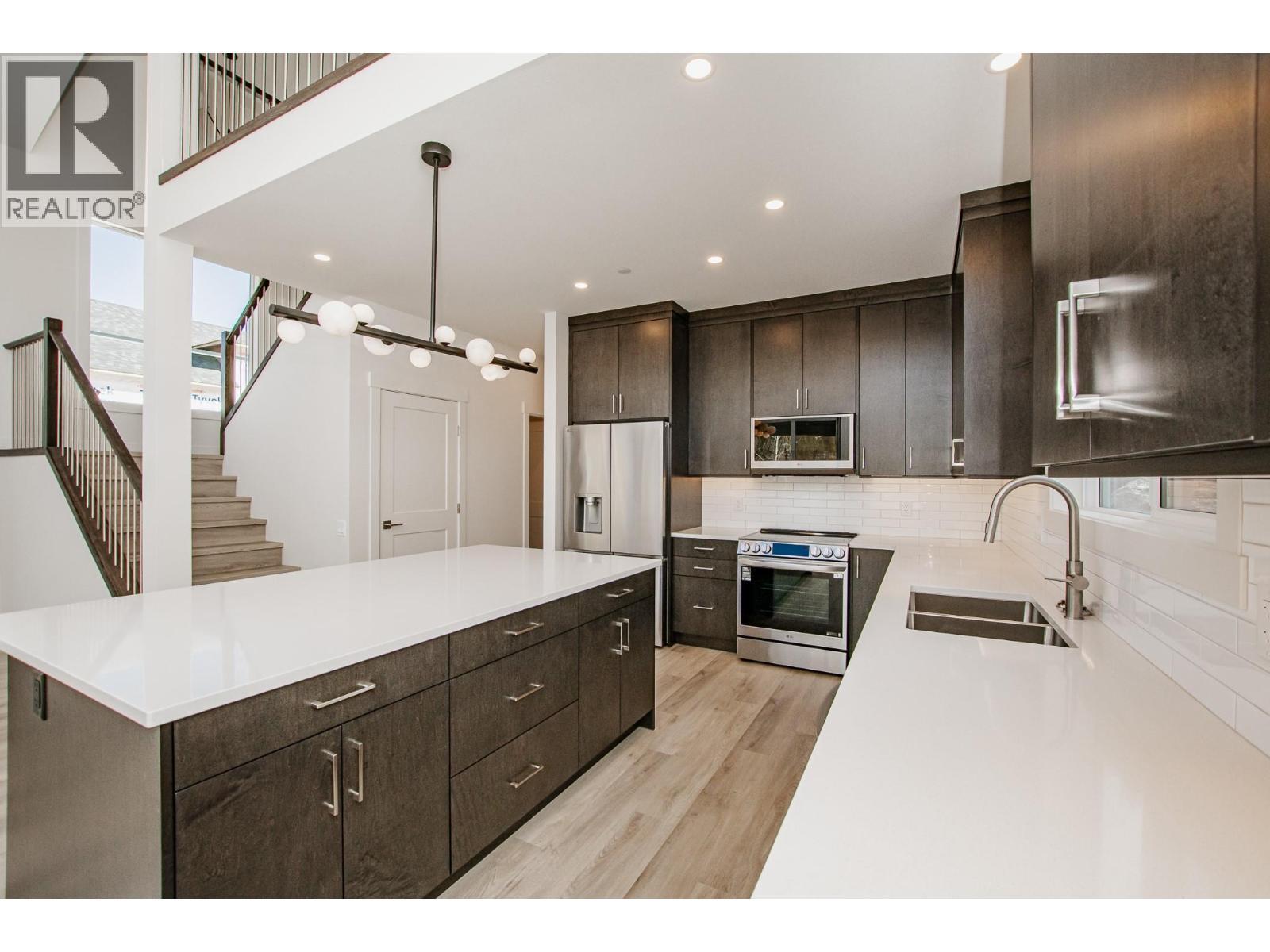 8200 97A Highway Unit# 8, Mara, BC - Indoor Photo Showing Kitchen With Double Sink With Upgraded Kitchen