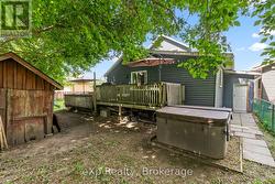 Private backyard with hot tub -