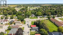 Steps to sports fields, park, splash pad! -