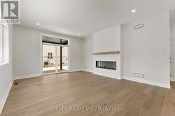 cozy fireplace with charming detail -