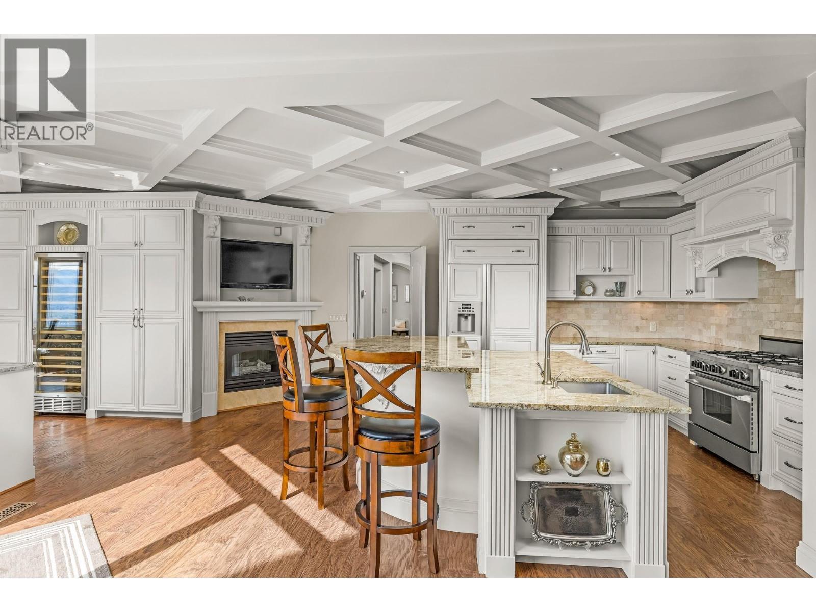 1284 Timothy Place, West Kelowna, BC - Indoor Photo Showing Kitchen With Fireplace