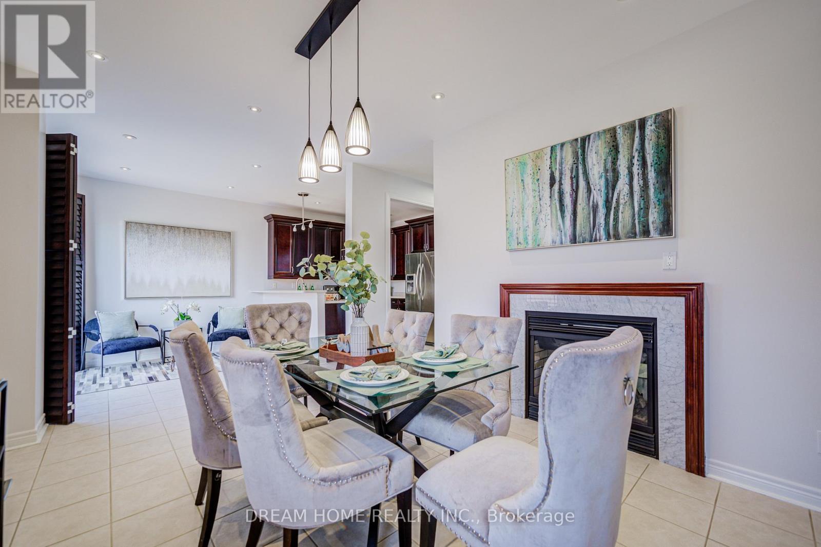 3519 Trilogy Trail, Mississauga, ON - Indoor Photo Showing Dining Room With Fireplace