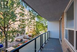 Large Private Covered Balcony w/Privacy Glass. -