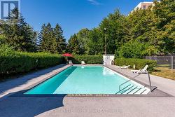 Gated Pool w/Shrub Privacy Shrubbery -