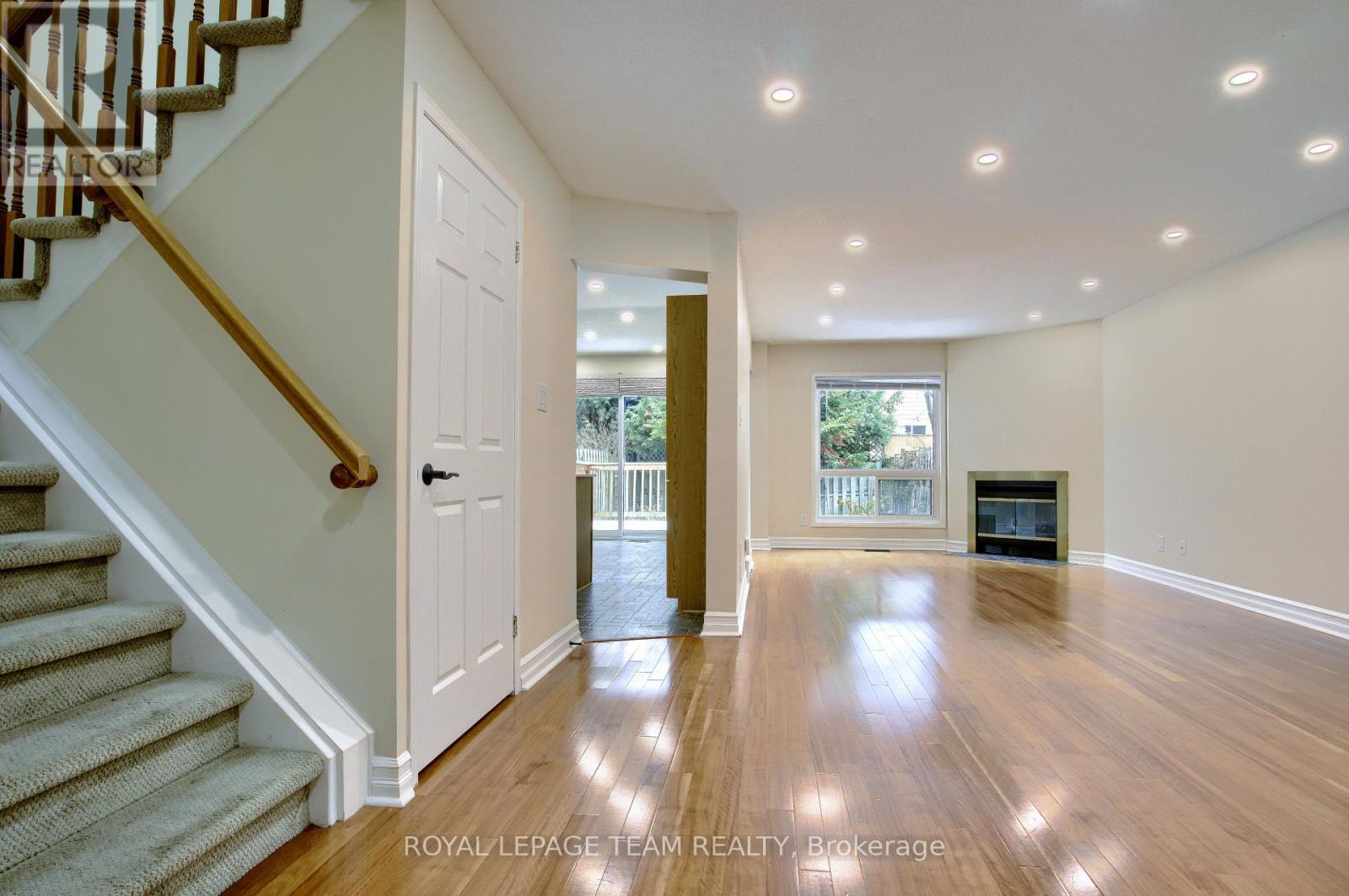 55 Mcgibbon Drive, Ottawa, ON - Indoor Photo Showing Other Room With Fireplace