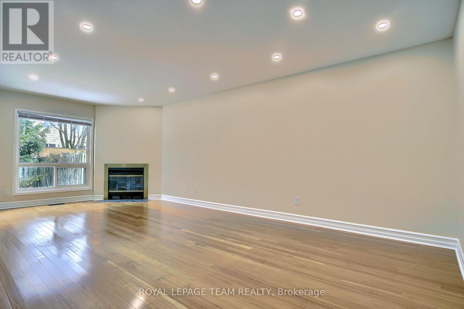 55 Mcgibbon Drive, Ottawa, ON - Indoor With Fireplace