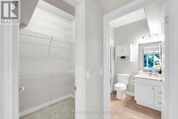 primary walk-in closet and bathroom -