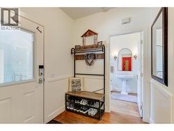 Mud room and side entrance adjacent to garage -