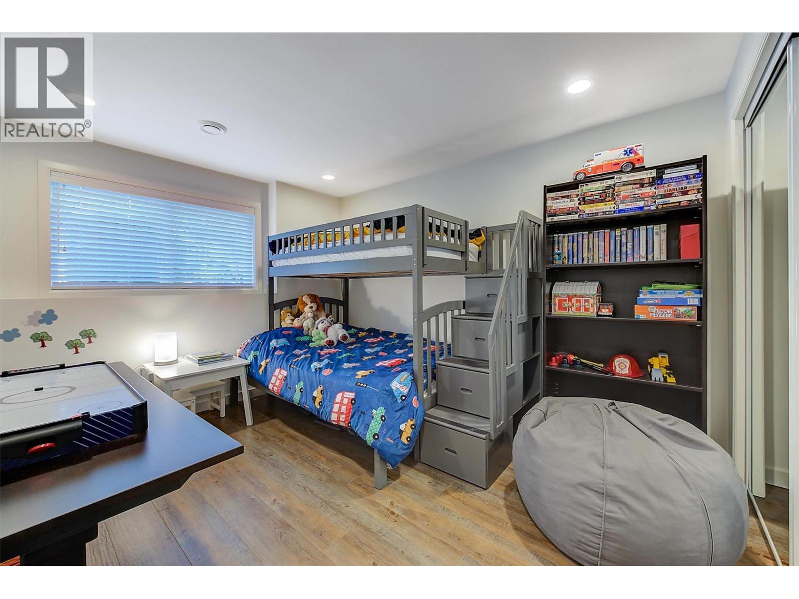 4th bedroom with large closet - 5127 Luckett Court, Kelowna, BC - Indoor Photo Showing Bedroom